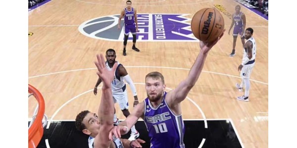 Kings slog Mavericks